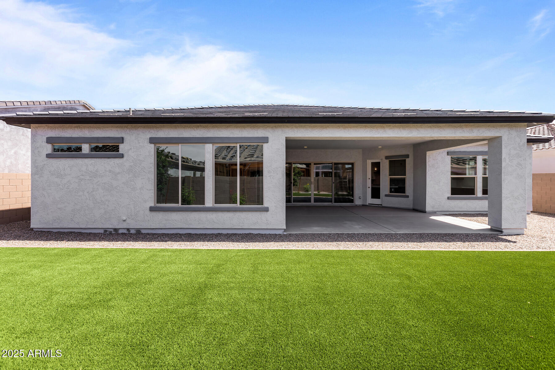 1042 Ridge Road Apache Junction, AZ 85120 - Photo 22 of 27 front view of a house with a yard
