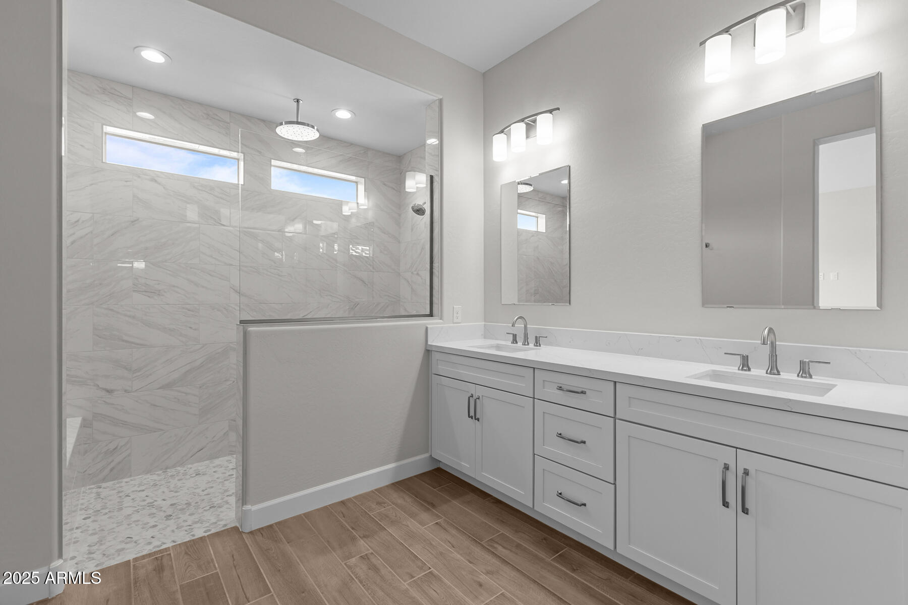 1042 Ridge Road Apache Junction, AZ 85120 - Photo 10 of 27 a bathroom with a double vanity sink and mirror