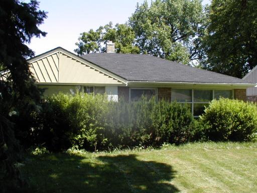 2300 Spruce Road Homewood, IL 60430 - Photo 1 of 1 a view of a house with a yard plants and large tree