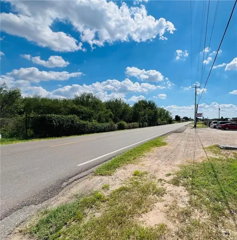 a view of a lake with a big yard