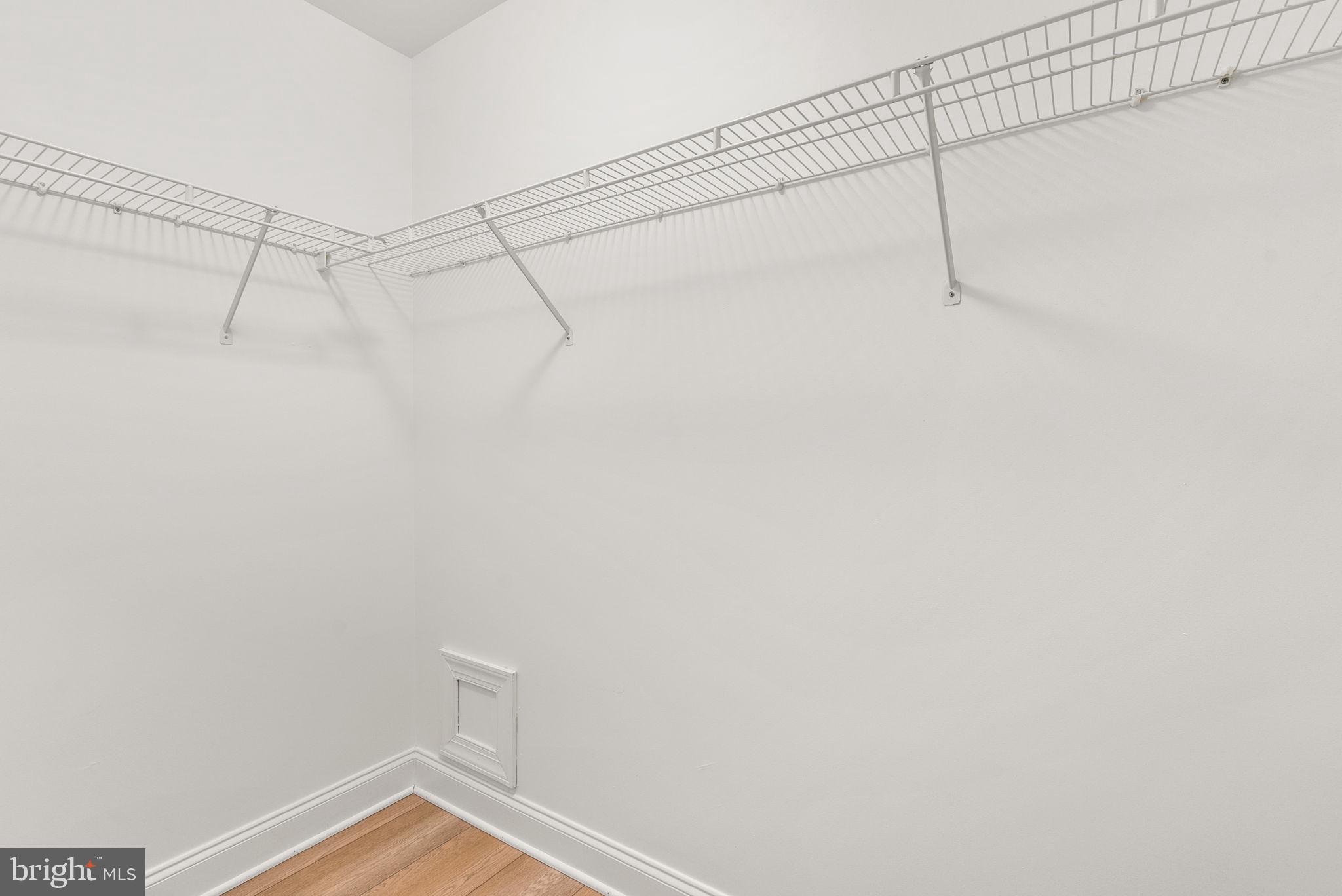 139 Chevy Chase Street, Unit 139 Gaithersburg, MD 20878 - Photo 22 of 27 a view of a room with racks on the wall