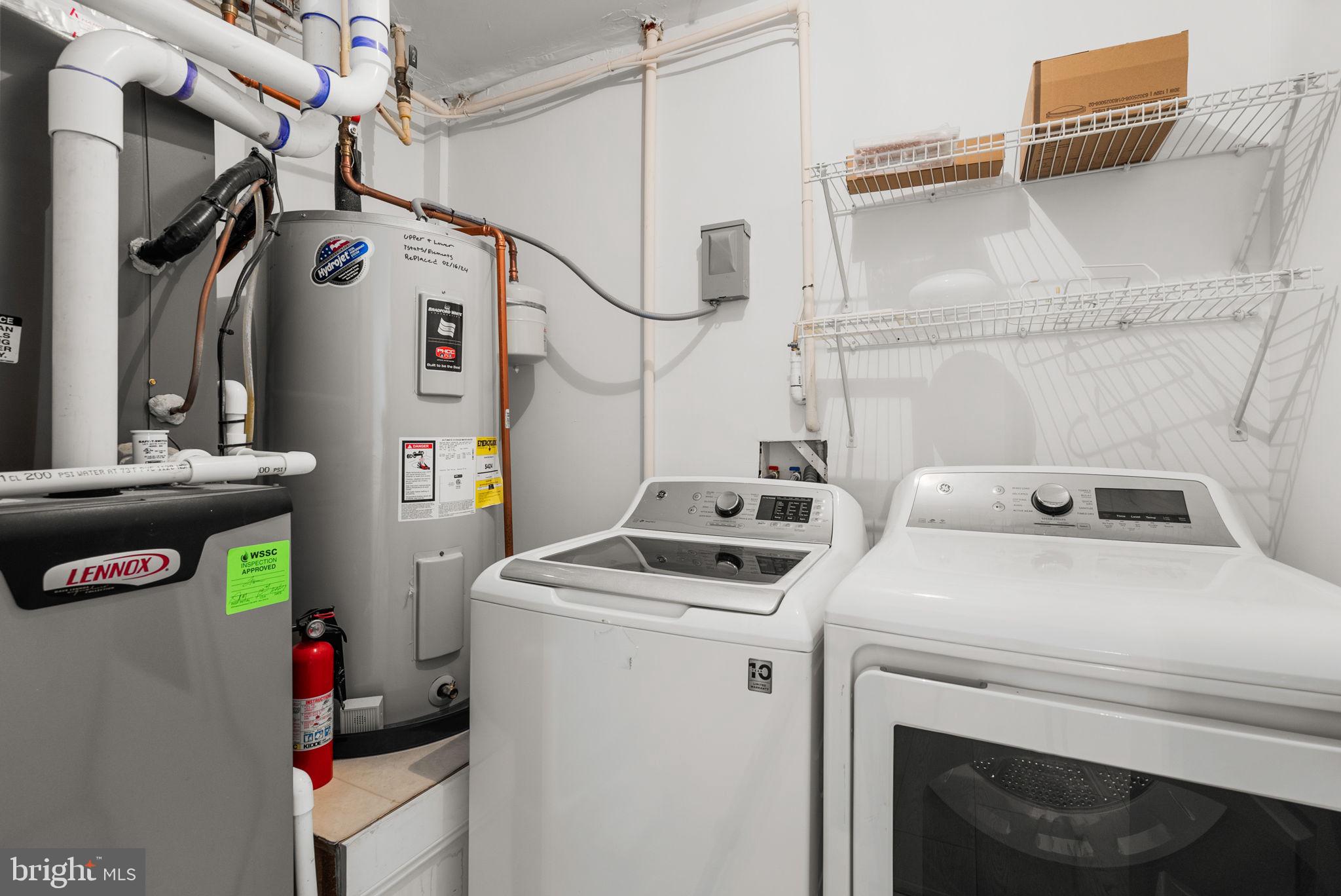 139 Chevy Chase Street, Unit 139 Gaithersburg, MD 20878 - Photo 23 of 27 a utility room with dryer and washer