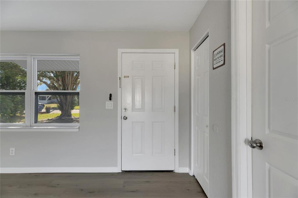 527 Fox Run Trail Apollo Beach, FL 33572 - Photo 11 of 73 a view of an entryway with wooden floor
