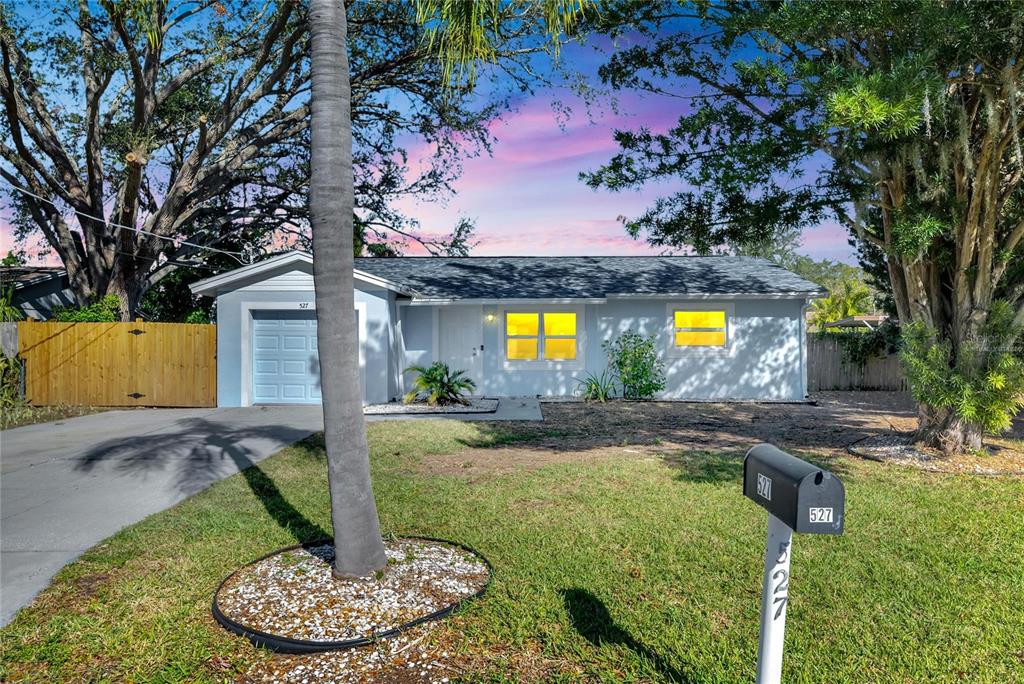 527 Fox Run Trail Apollo Beach, FL 33572 - Photo 2 of 73 a swimming pool with some trees