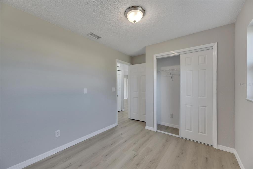 527 Fox Run Trail Apollo Beach, FL 33572 - Photo 33 of 73 wooden floor in an empty room