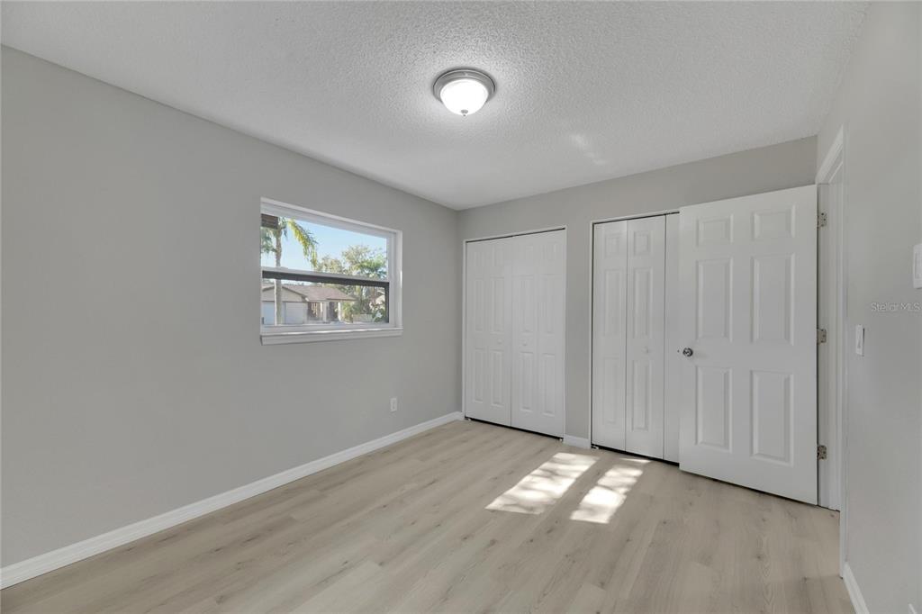 527 Fox Run Trail Apollo Beach, FL 33572 - Photo 37 of 73 a view of an empty room with wooden floor