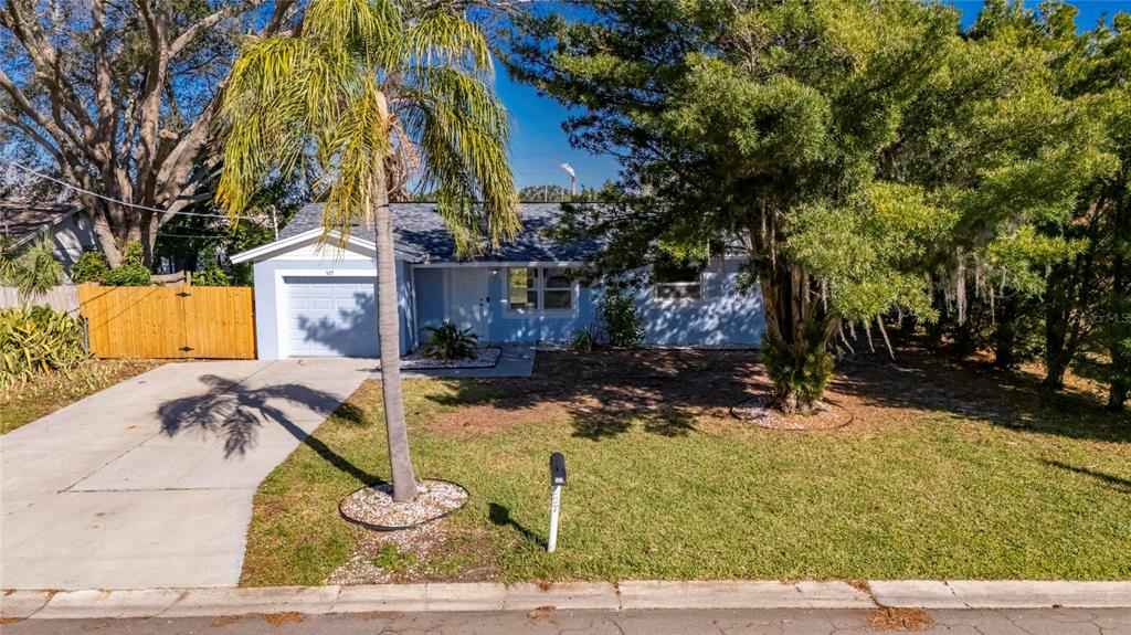 527 Fox Run Trail Apollo Beach, FL 33572 - Photo 49 of 73 a view of a house with a yard