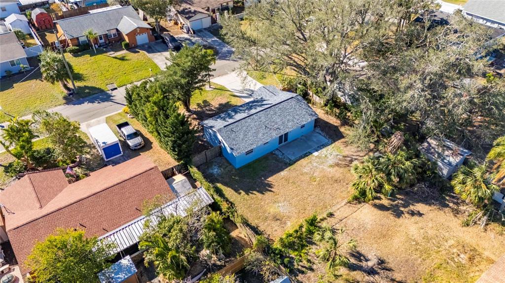 527 Fox Run Trail Apollo Beach, FL 33572 - Photo 70 of 73 an aerial view of a house with a yard and garden