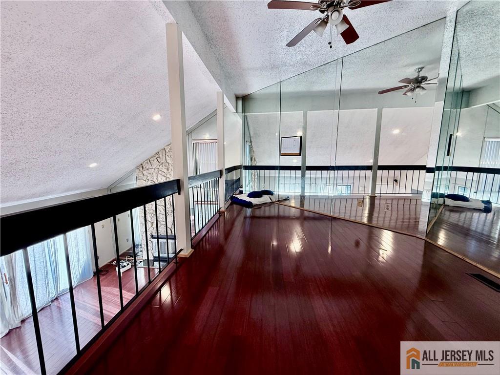 105 Westgate Drive, Unit 105 Edison, NJ 08820 - Photo 17 of 28 a view of interior space with wooden floor