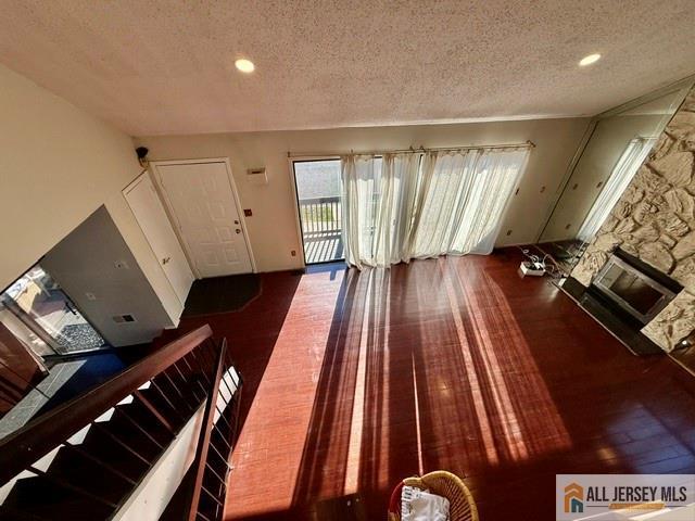 105 Westgate Drive, Unit 105 Edison, NJ 08820 - Photo 6 of 28 a view of an empty room with wooden floor