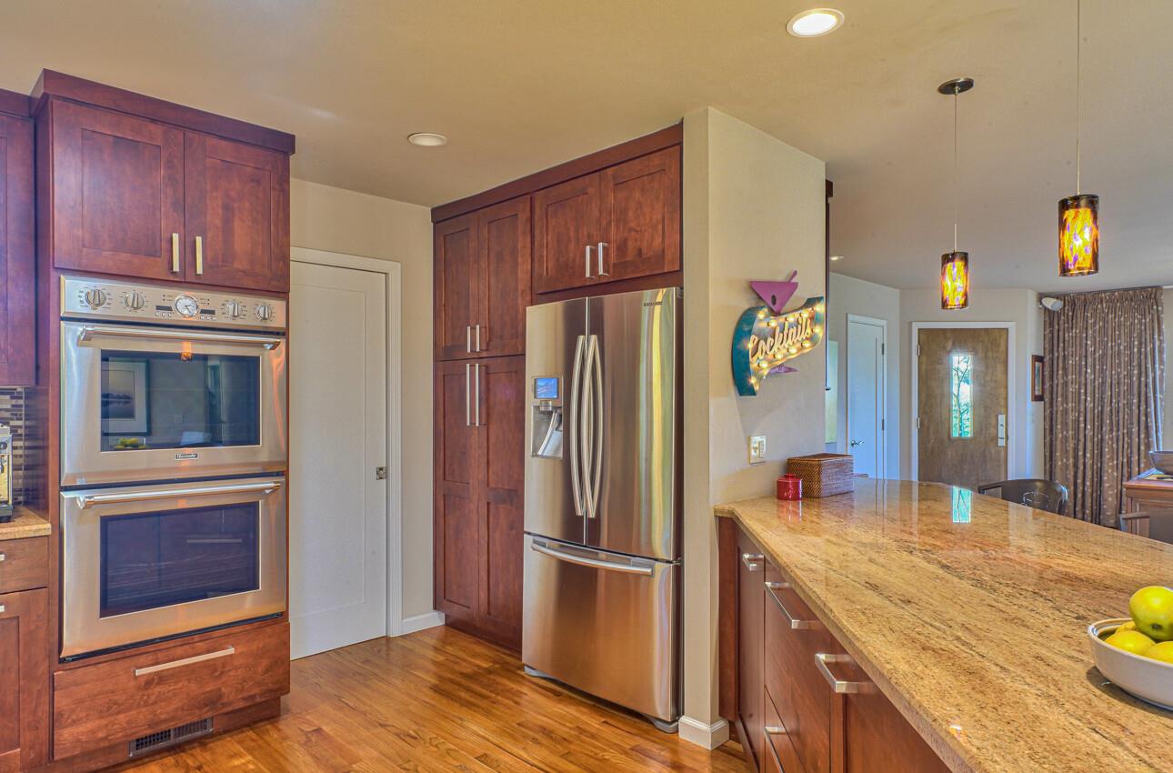 118 Enos Drive Salinas, CA 93908 - Photo 15 of 59 a kitchen with a refrigerator and countertop