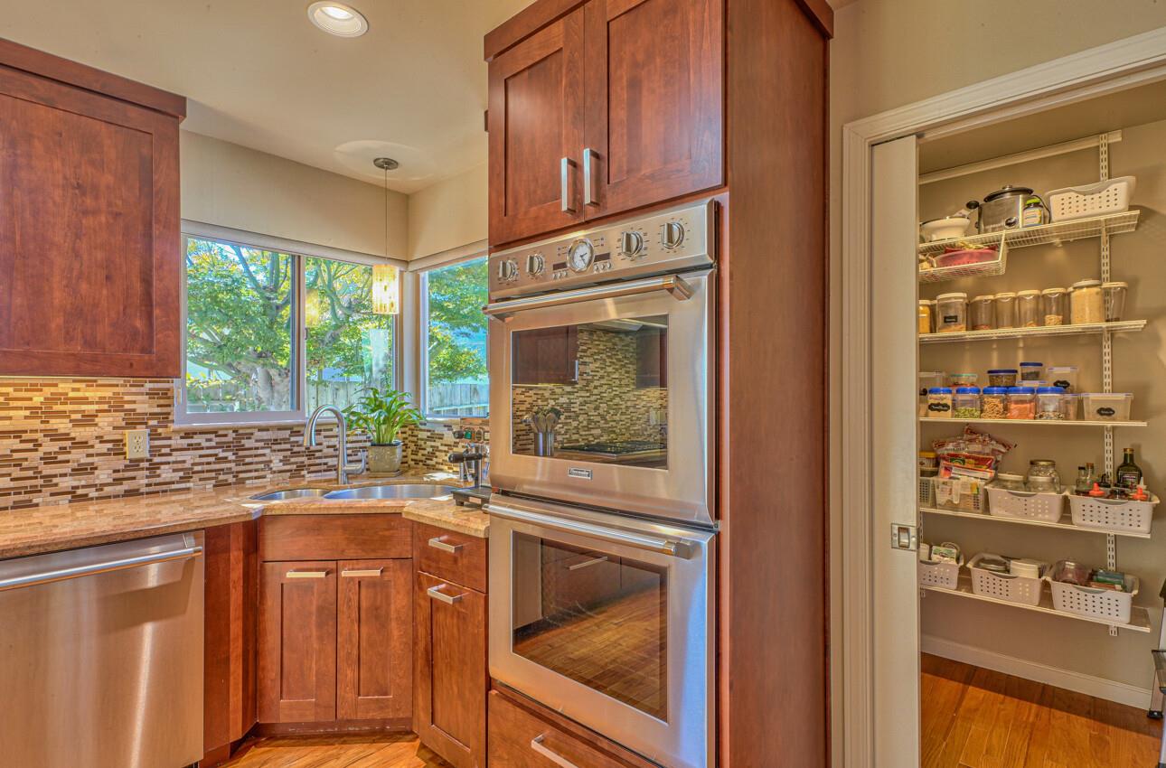 118 Enos Drive Salinas, CA 93908 - Photo 16 of 59 a kitchen with granite countertop cabinets and window