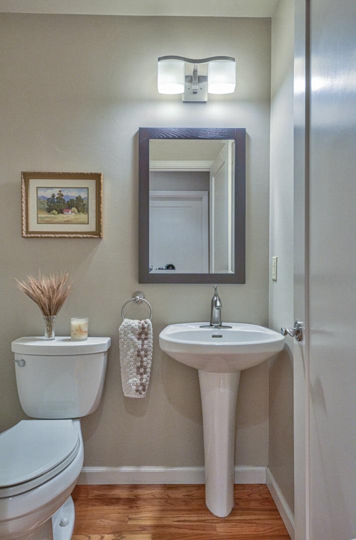 118 Enos Drive Salinas, CA 93908 - Photo 22 of 59 a bathroom with a toilet sink and mirror