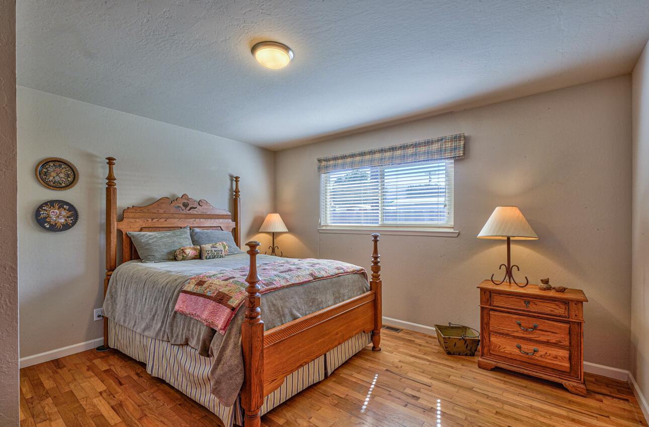 118 Enos Drive Salinas, CA 93908 - Photo 35 of 59 a bedroom with a bed and a lamp