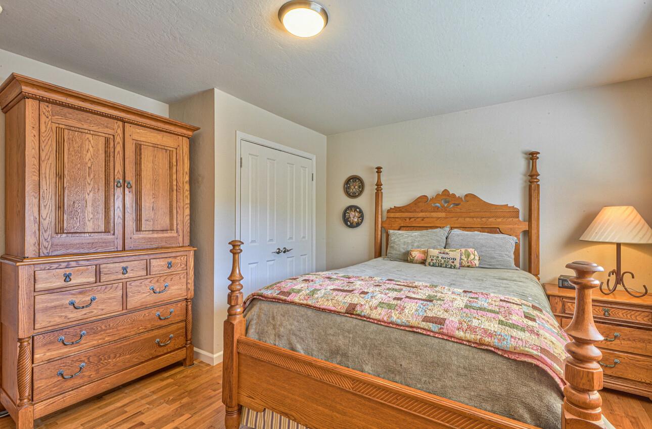 118 Enos Drive Salinas, CA 93908 - Photo 36 of 59 a bedroom with a bed and wooden floor