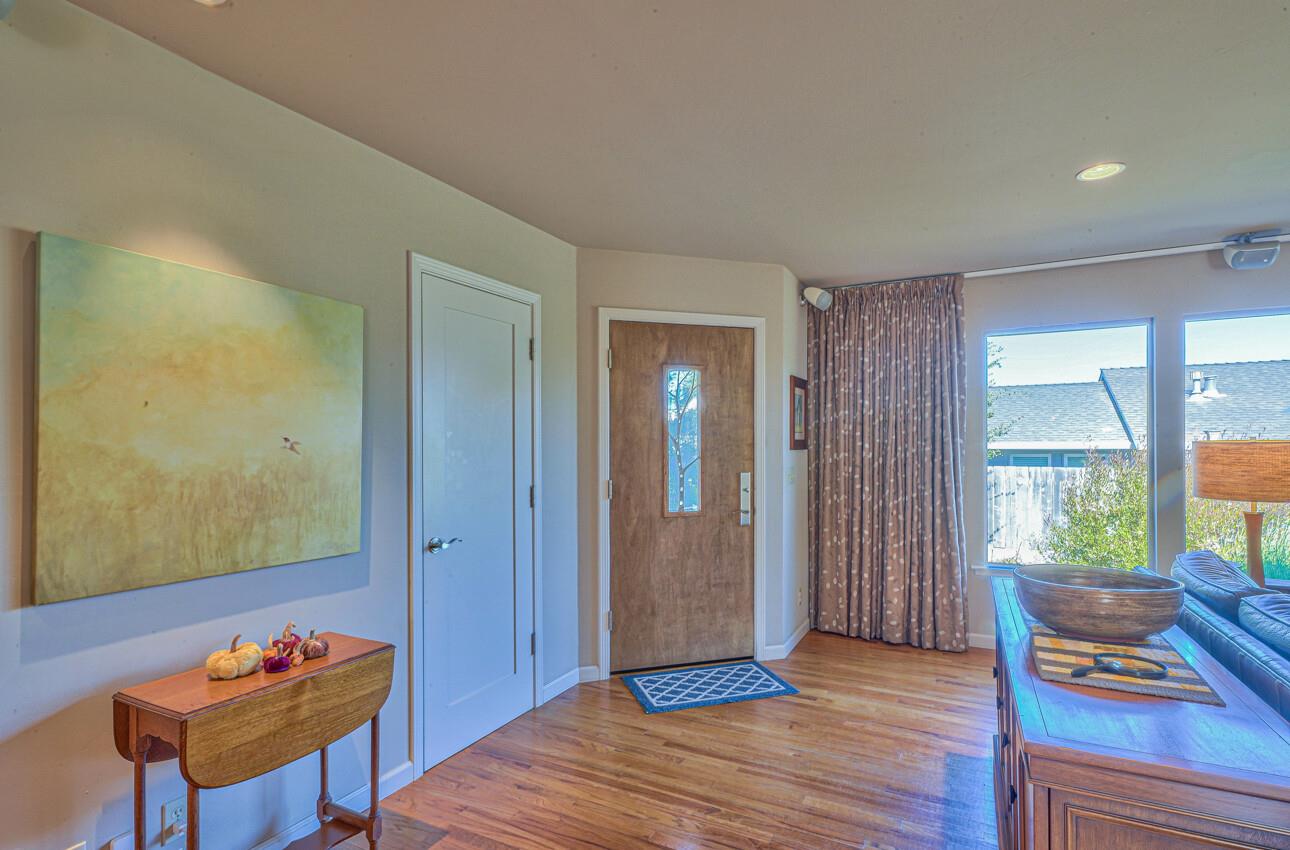 118 Enos Drive Salinas, CA 93908 - Photo 4 of 59 a view of room with wooden floor and windows