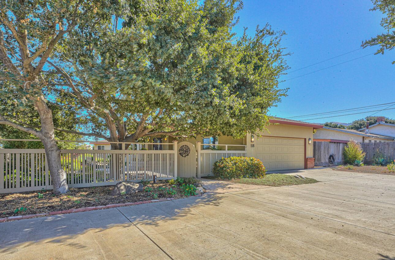 118 Enos Drive Salinas, CA 93908 - Photo 44 of 59 a front view of a house with a yard and garage