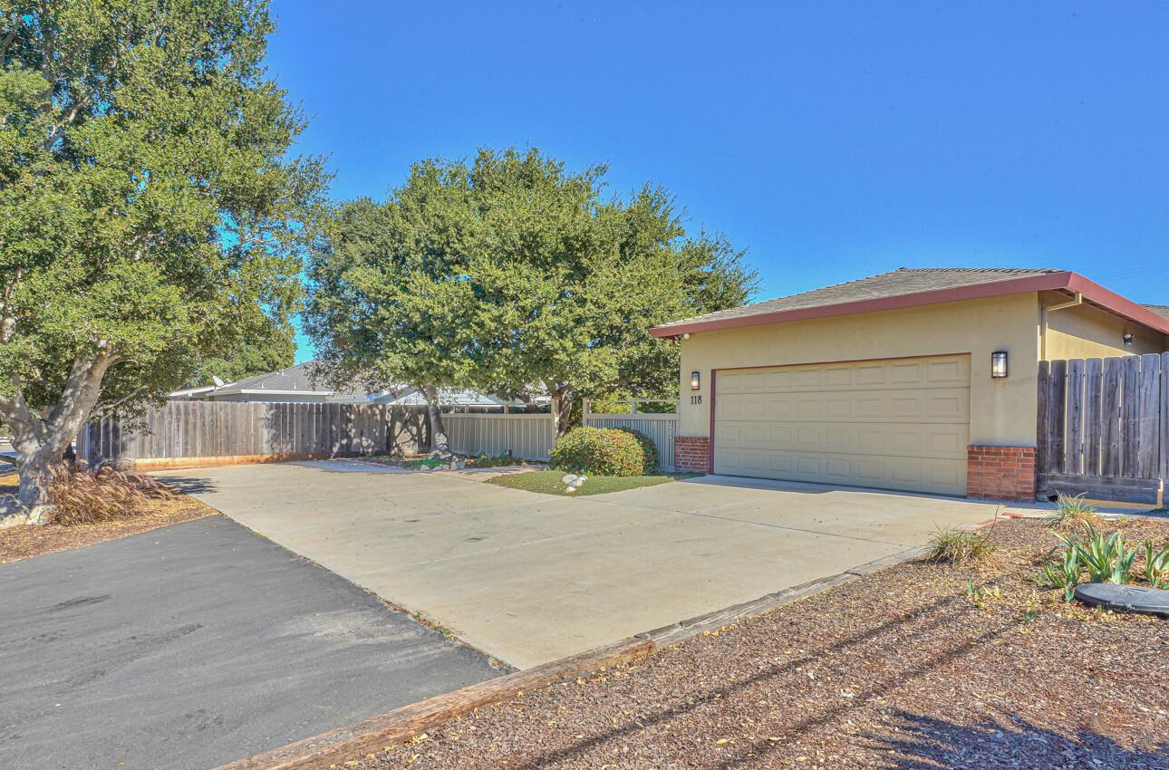 118 Enos Drive Salinas, CA 93908 - Photo 45 of 59 a front view of a house with a yard and garage