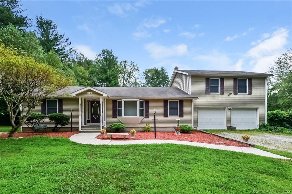 15 Creasey Road Brooklyn, CT 06234 - Photo 1 of 1 a front view of house with yard and green space