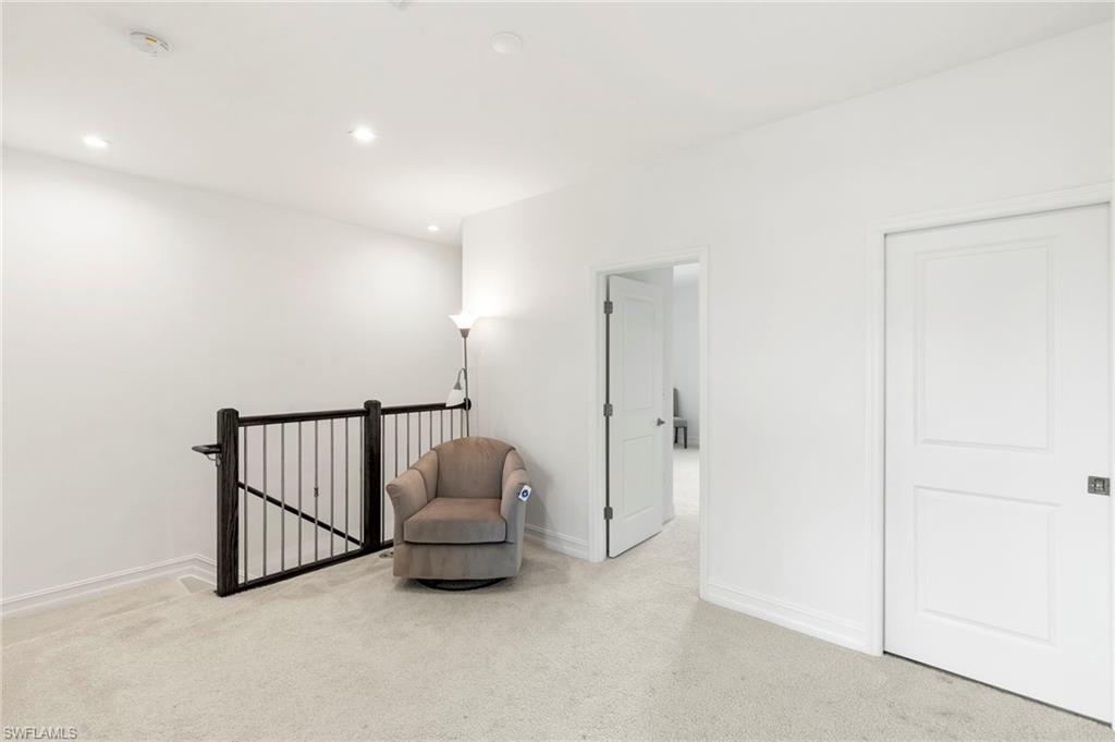 7572 Carnegie Way Naples, FL 34119 - Photo 26 of 43 a view of an empty room