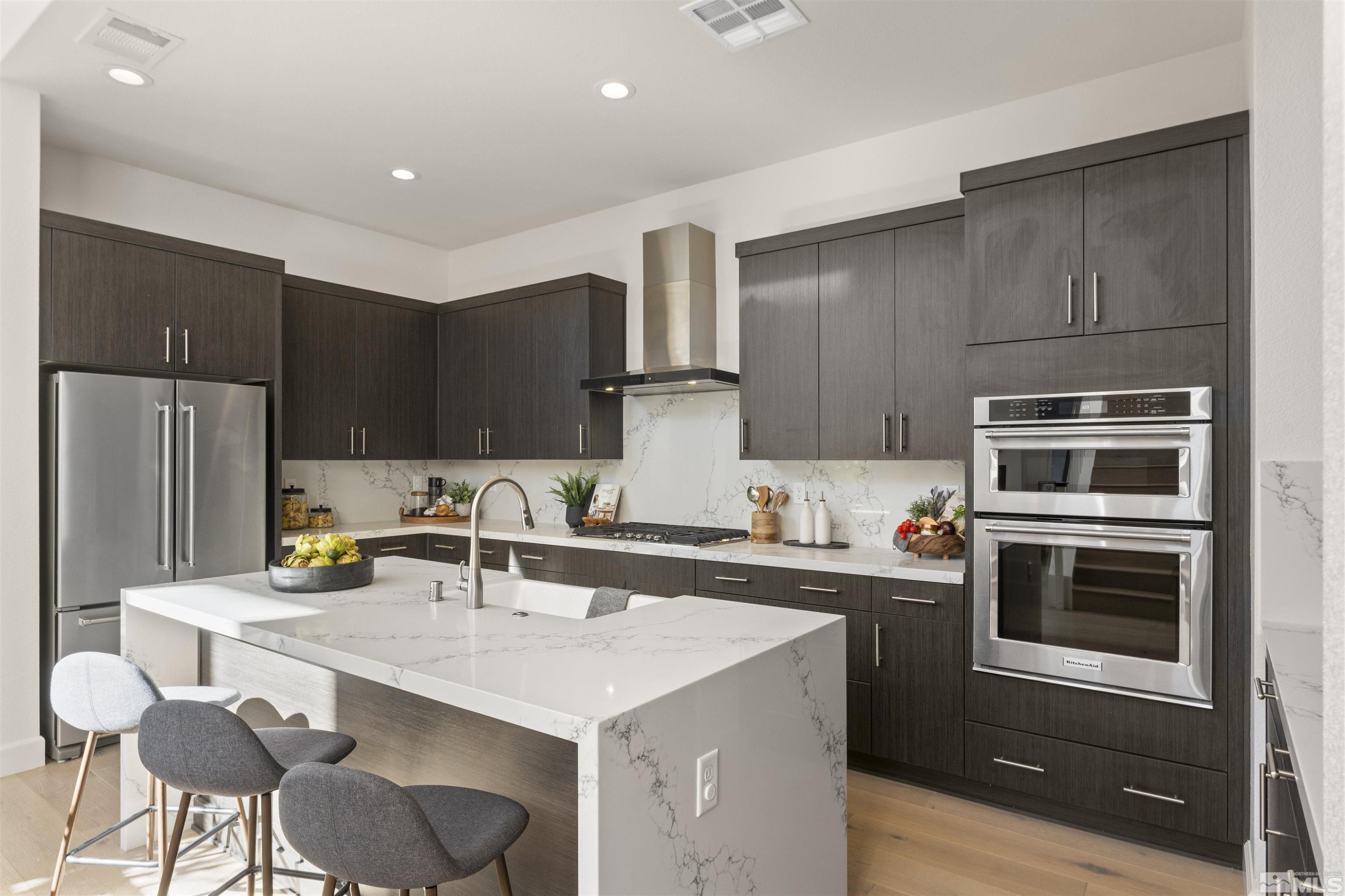 5421 Phillipa Drive Reno, NV 89511 - Photo 11 of 39 a kitchen with a sink stove and refrigerator