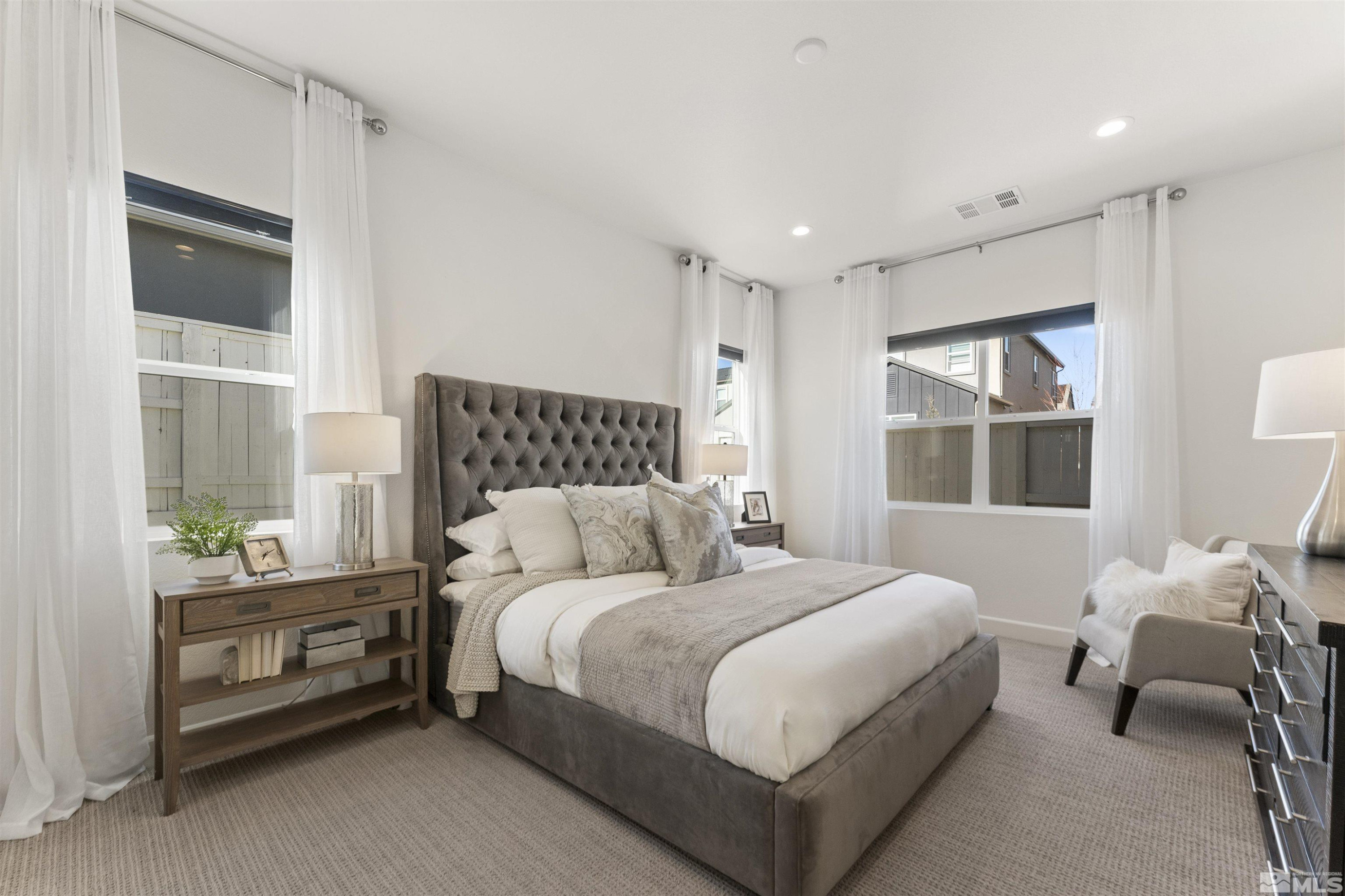 5421 Phillipa Drive Reno, NV 89511 - Photo 13 of 39 a bedroom with a bed and a window