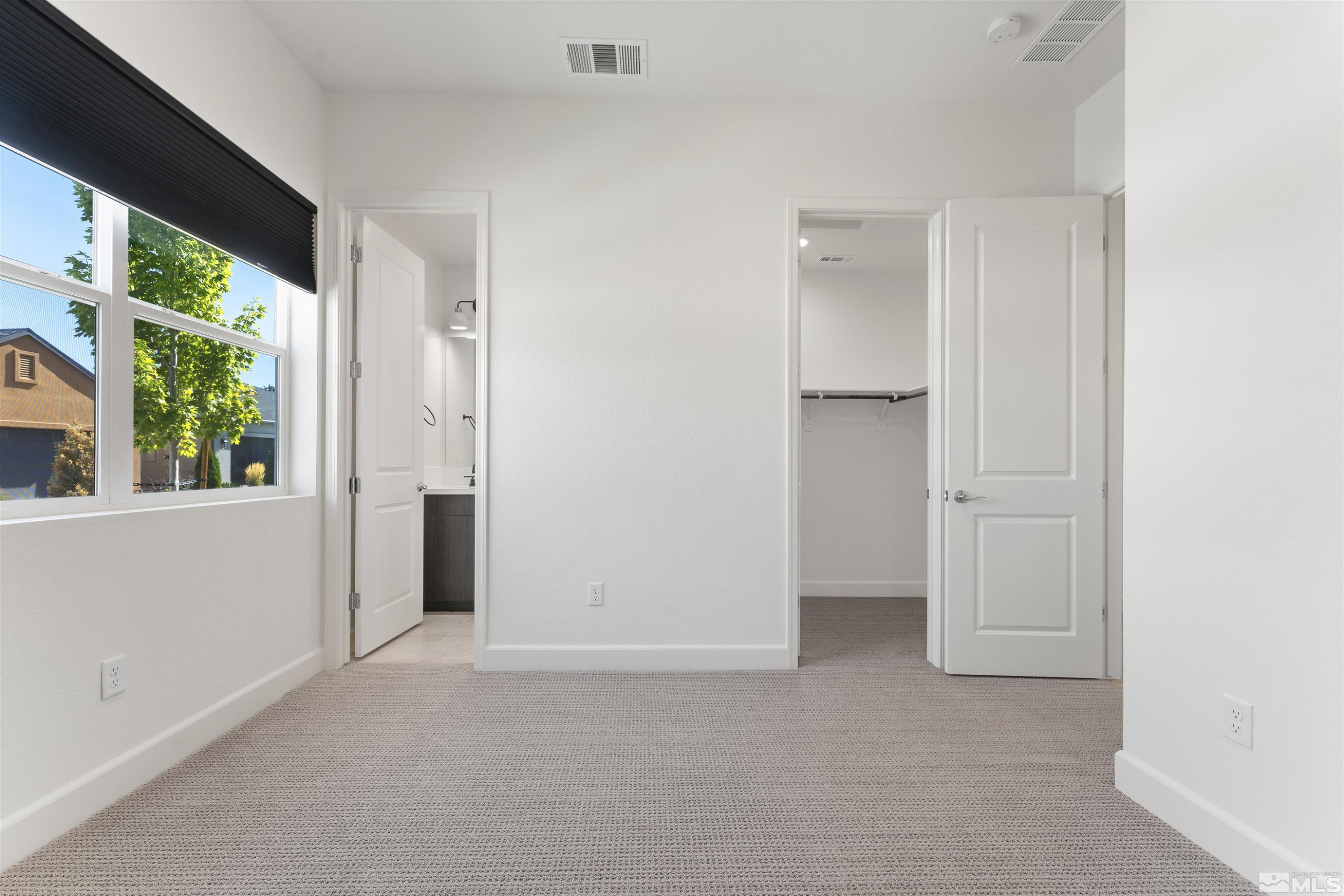 5421 Phillipa Drive Reno, NV 89511 - Photo 18 of 39 a view of an empty room with a window