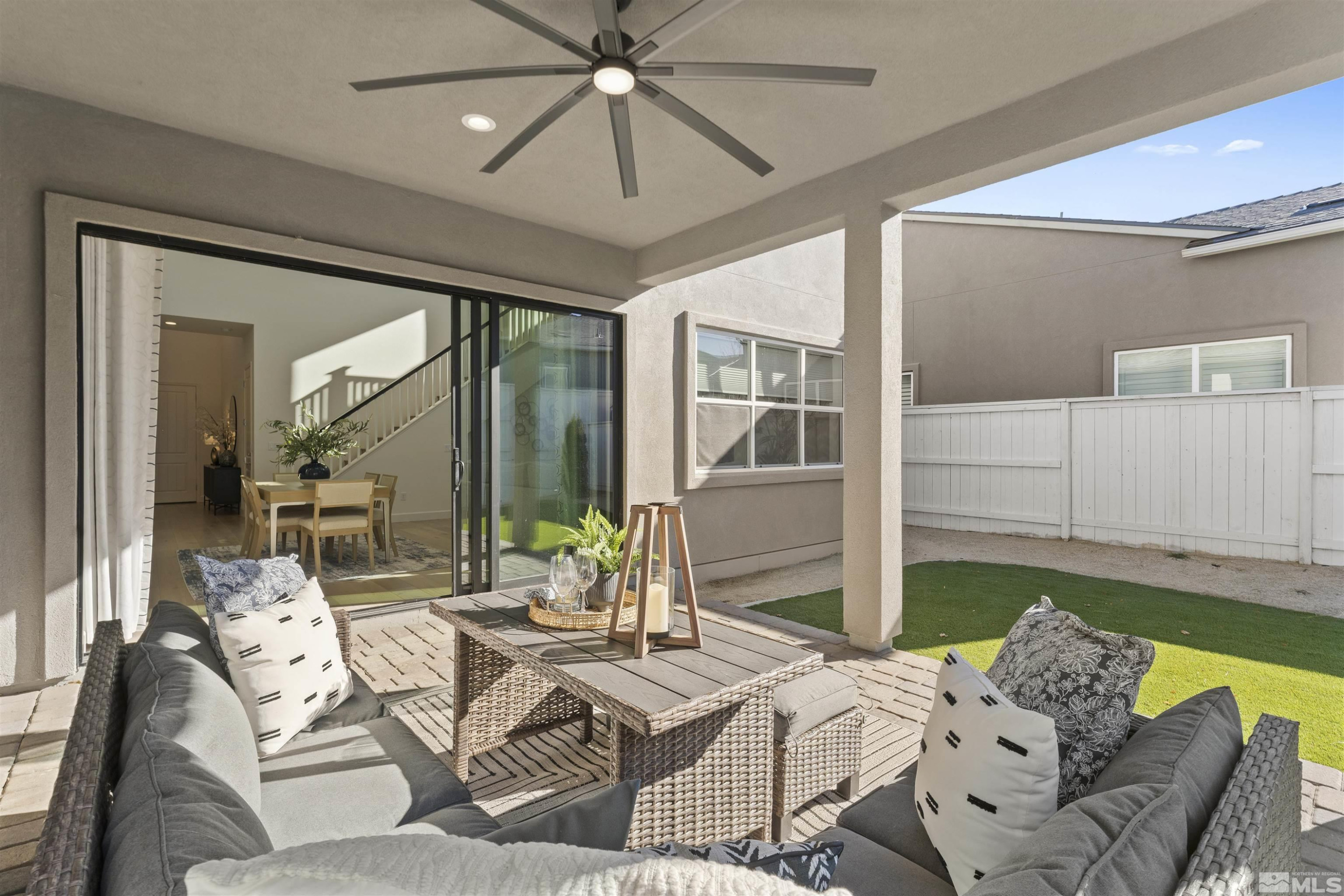 5421 Phillipa Drive Reno, NV 89511 - Photo 29 of 39 a bedroom with furniture and a large window