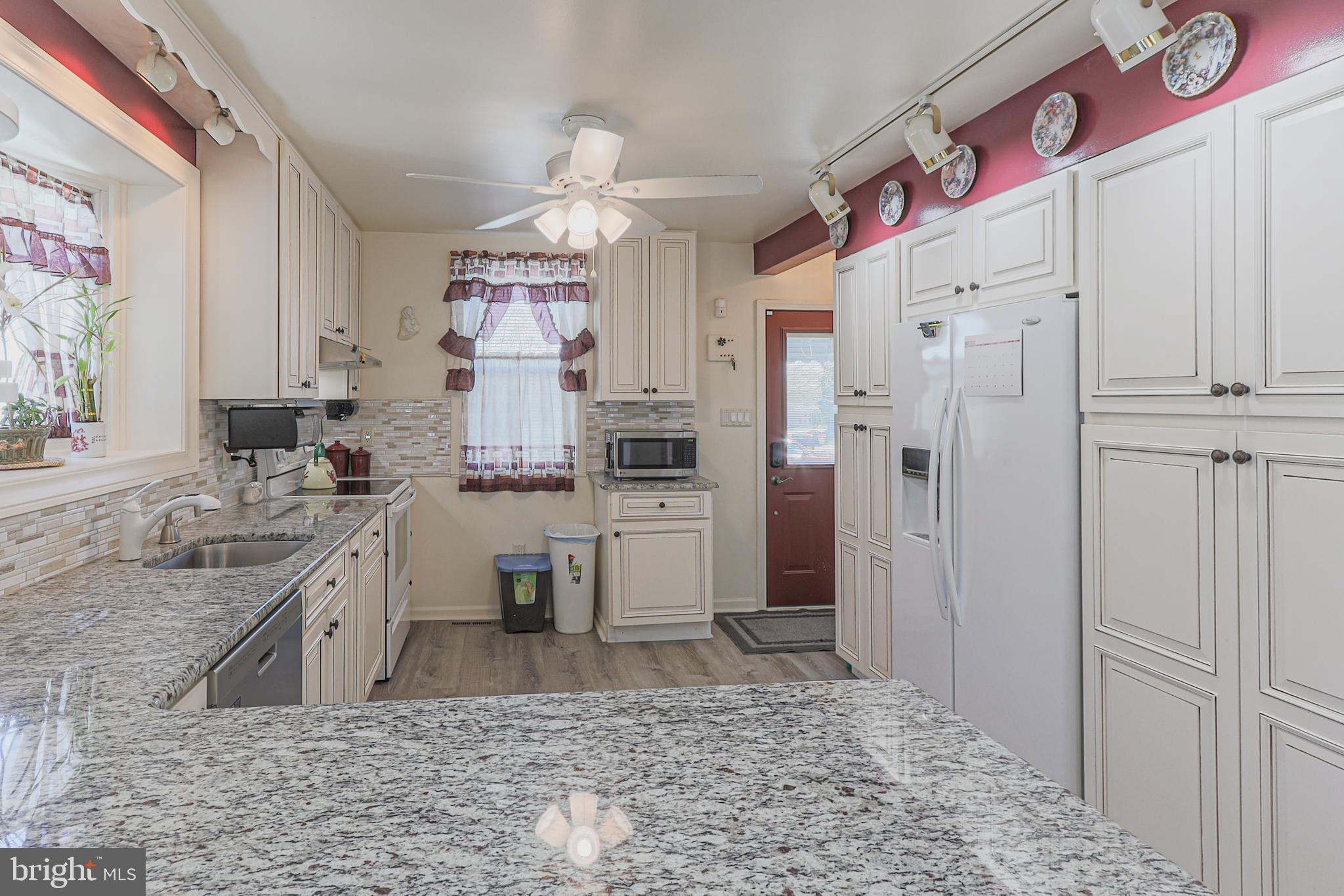 103 Valley Road Wilmington, DE 19804 - Photo 12 of 47 Updated Kitchen with Wall of Cabinets