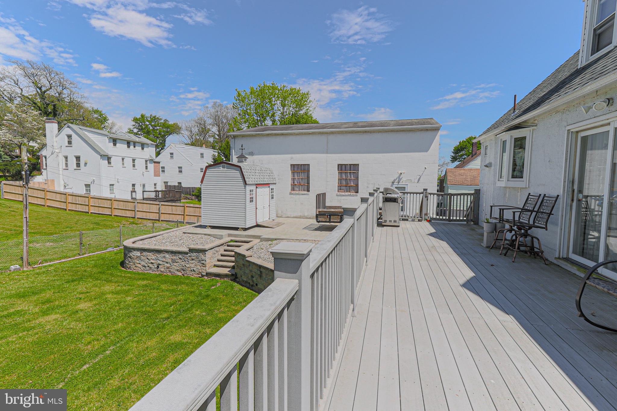 103 Valley Road Wilmington, DE 19804 - Photo 36 of 47 Deck with view of Side of Garage and Stonework