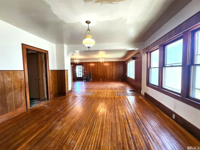a view of gallery with wooden floor