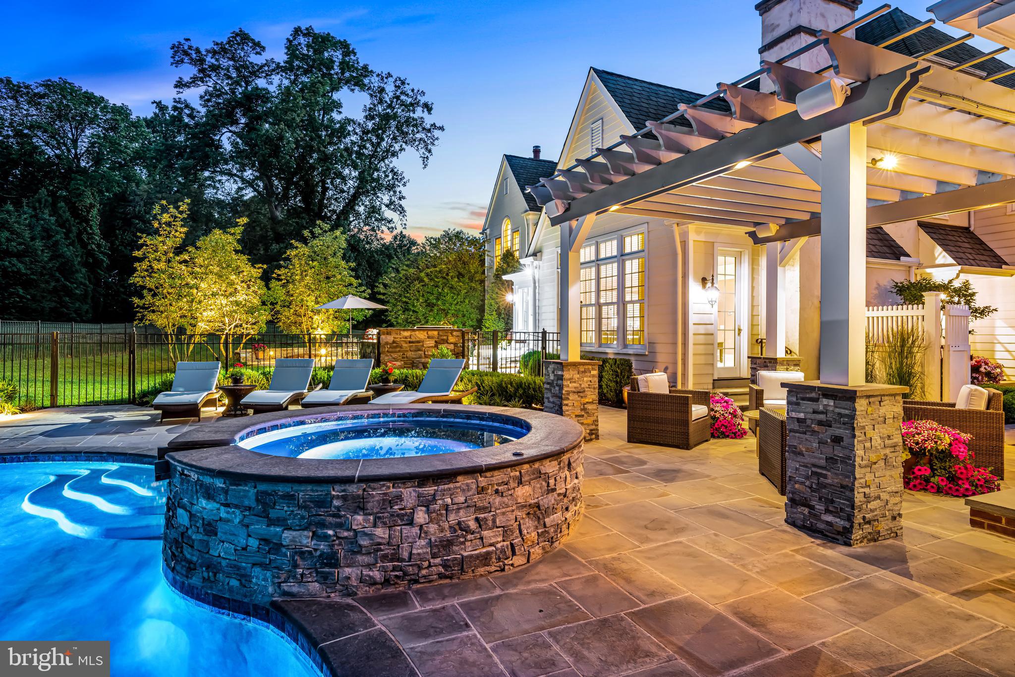 318 Winfield Road Devon, PA 19333 - Photo 13 of 97 a view of a patio with couches table and chairs and potted plants