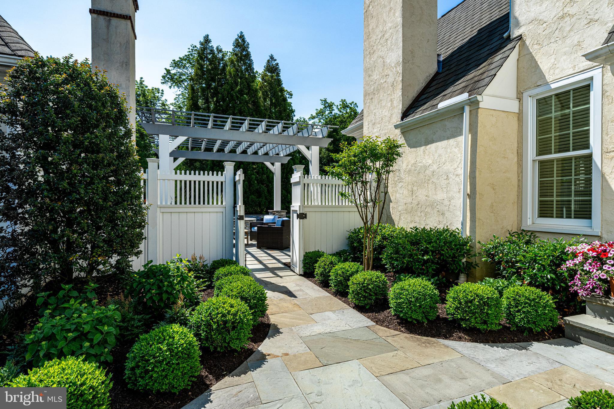 318 Winfield Road Devon, PA 19333 - Photo 21 of 97 a front view of a house with a yard