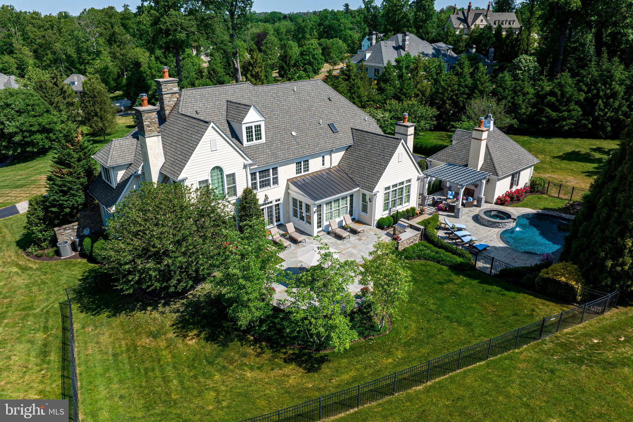 318 Winfield Road Devon, PA 19333 - Photo 24 of 97 an aerial view of a house with garden space and street view