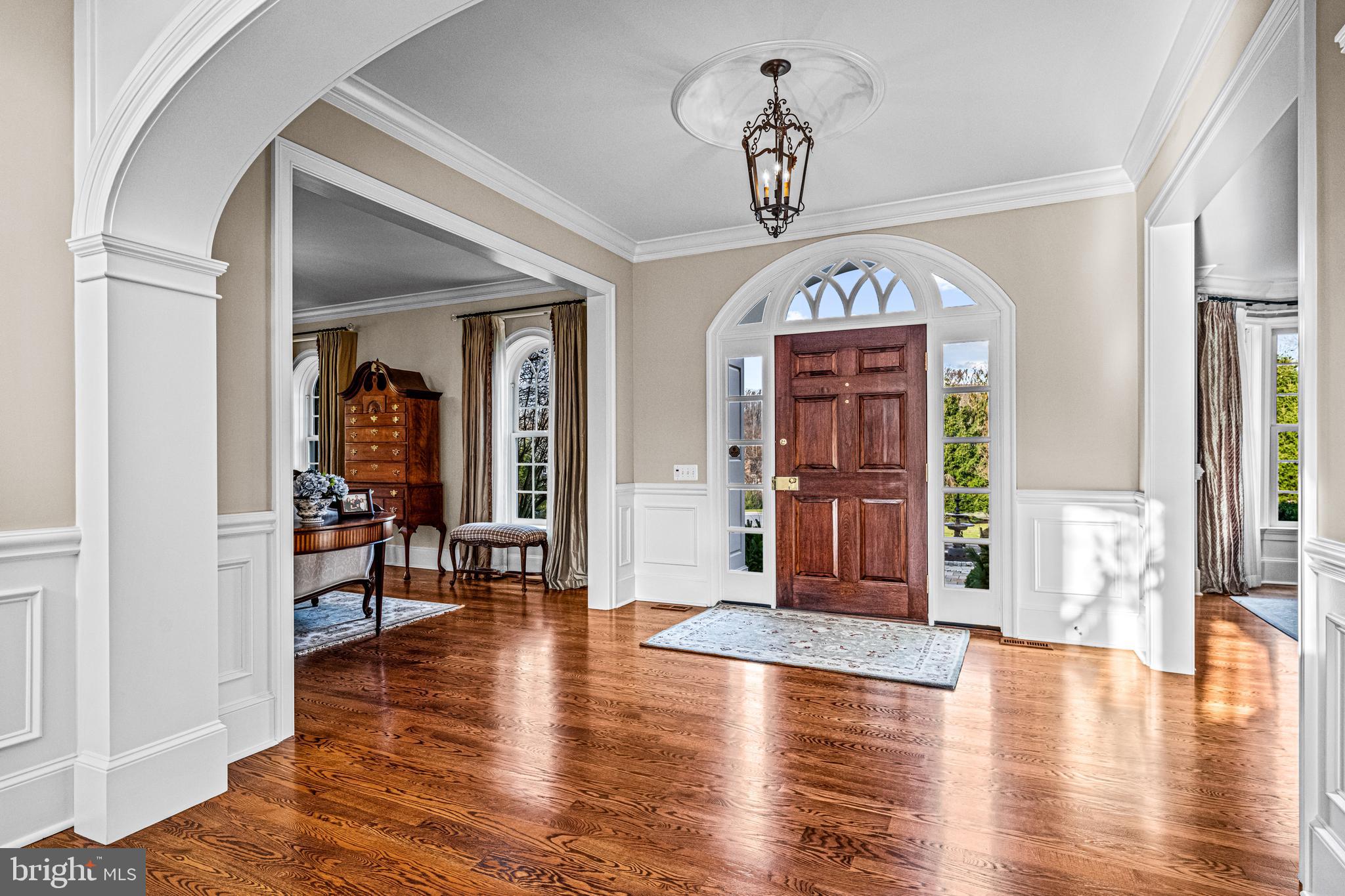 318 Winfield Road Devon, PA 19333 - Photo 38 of 97 a view of a hallway with wooden floor and windows