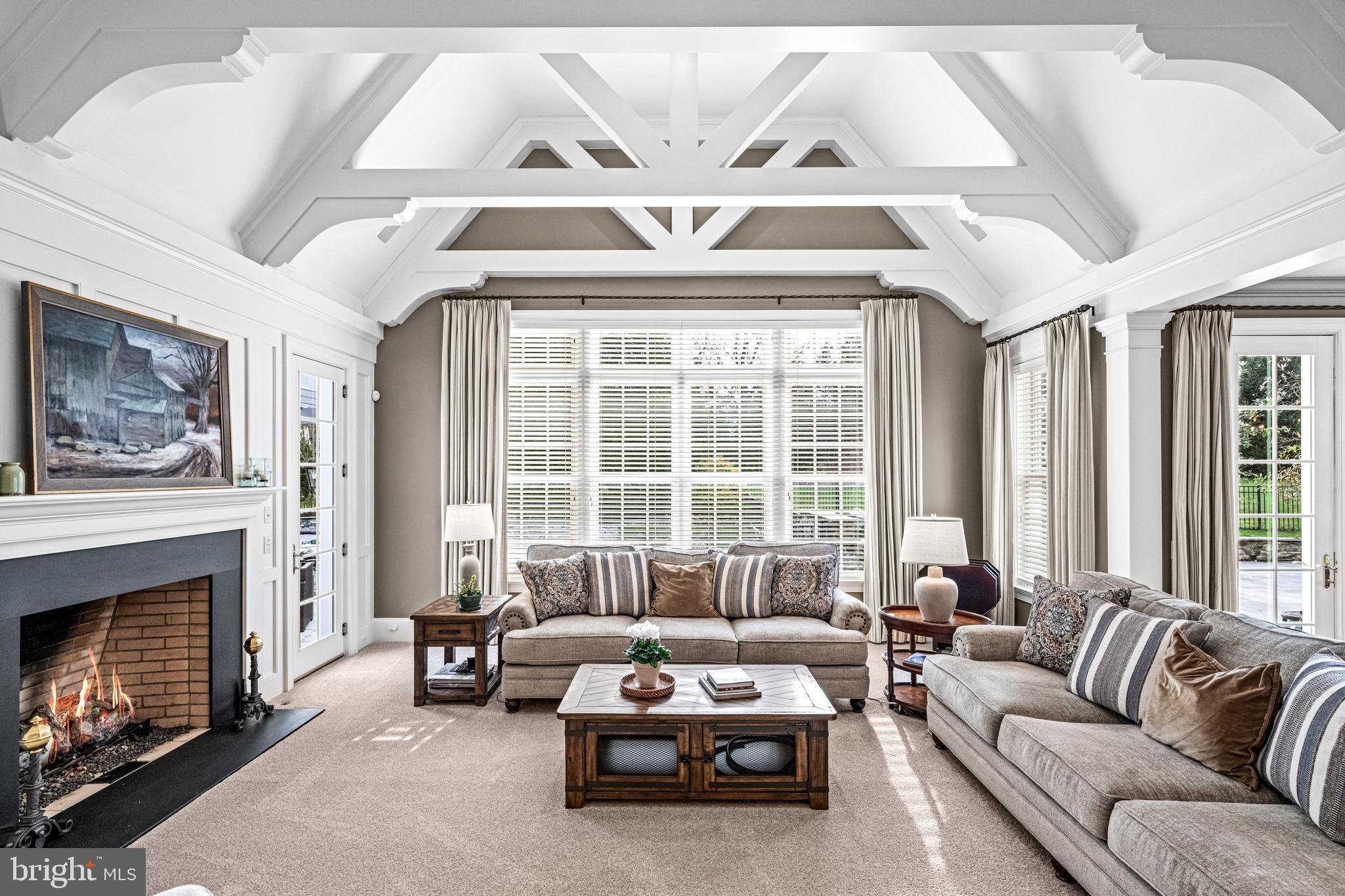 318 Winfield Road Devon, PA 19333 - Photo 53 of 97 a living room with furniture and a fireplace