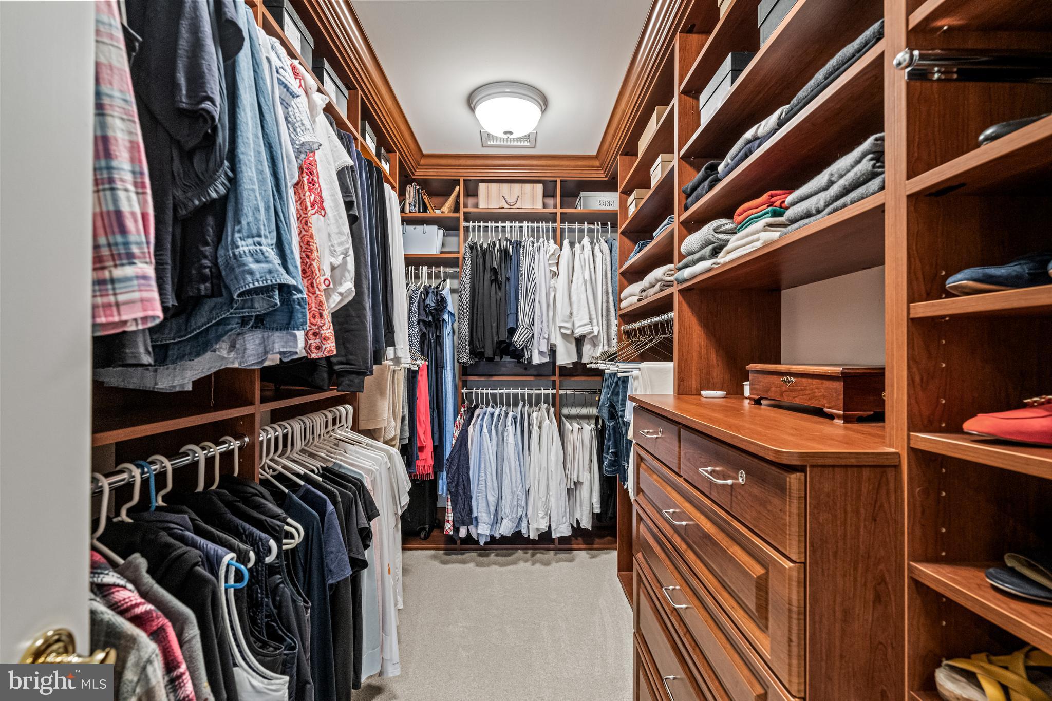 318 Winfield Road Devon, PA 19333 - Photo 66 of 97 a view of walk in closet with clothes and shoes