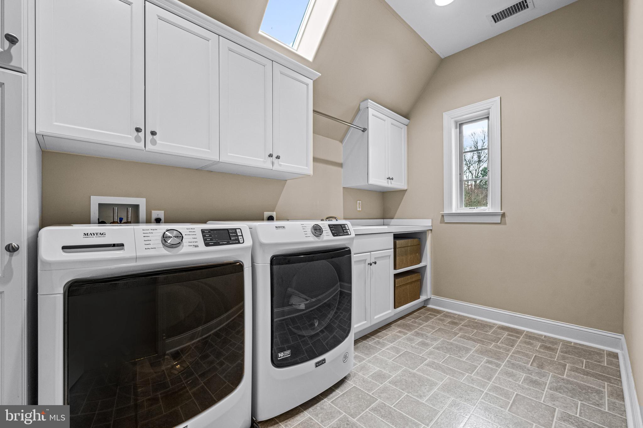 318 Winfield Road Devon, PA 19333 - Photo 83 of 97 a utility room with sink dryer and washer