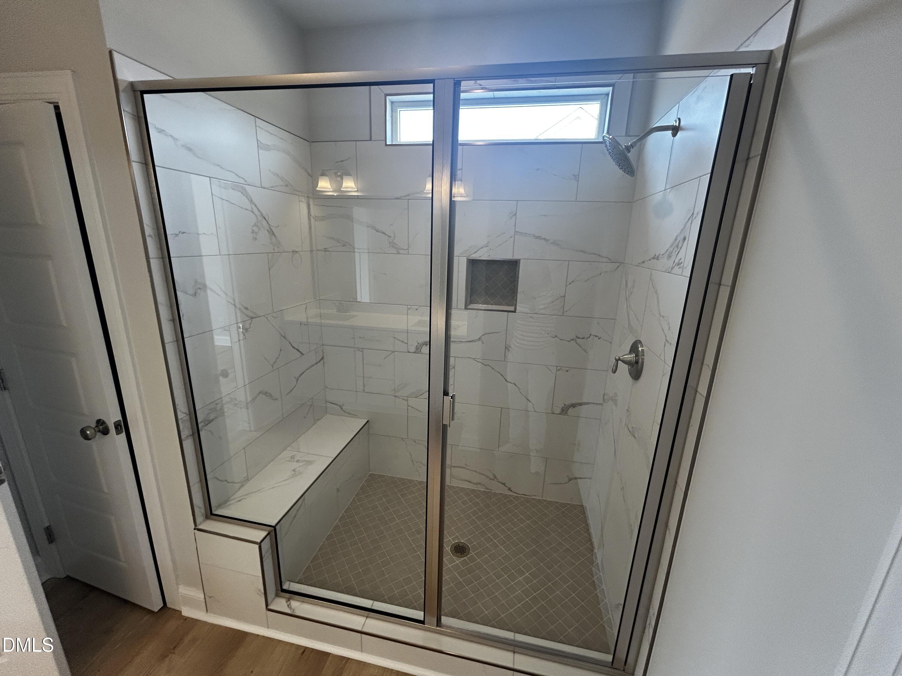 5495 Finch Road Bailey, NC 27880 - Photo 19 of 32 a bathroom with a glass shower door