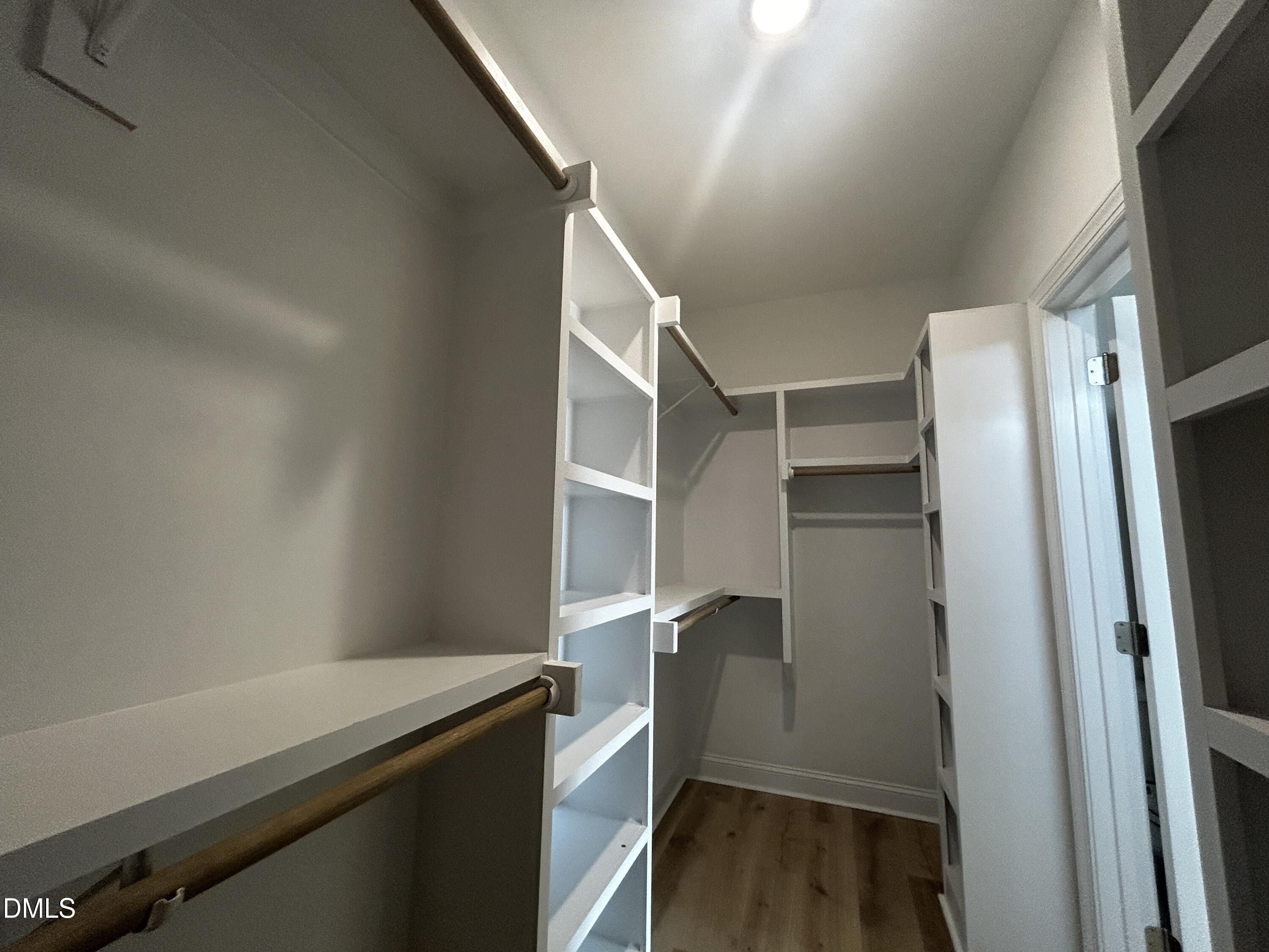 5495 Finch Road Bailey, NC 27880 - Photo 20 of 32 a room with wooden floor and cabinets