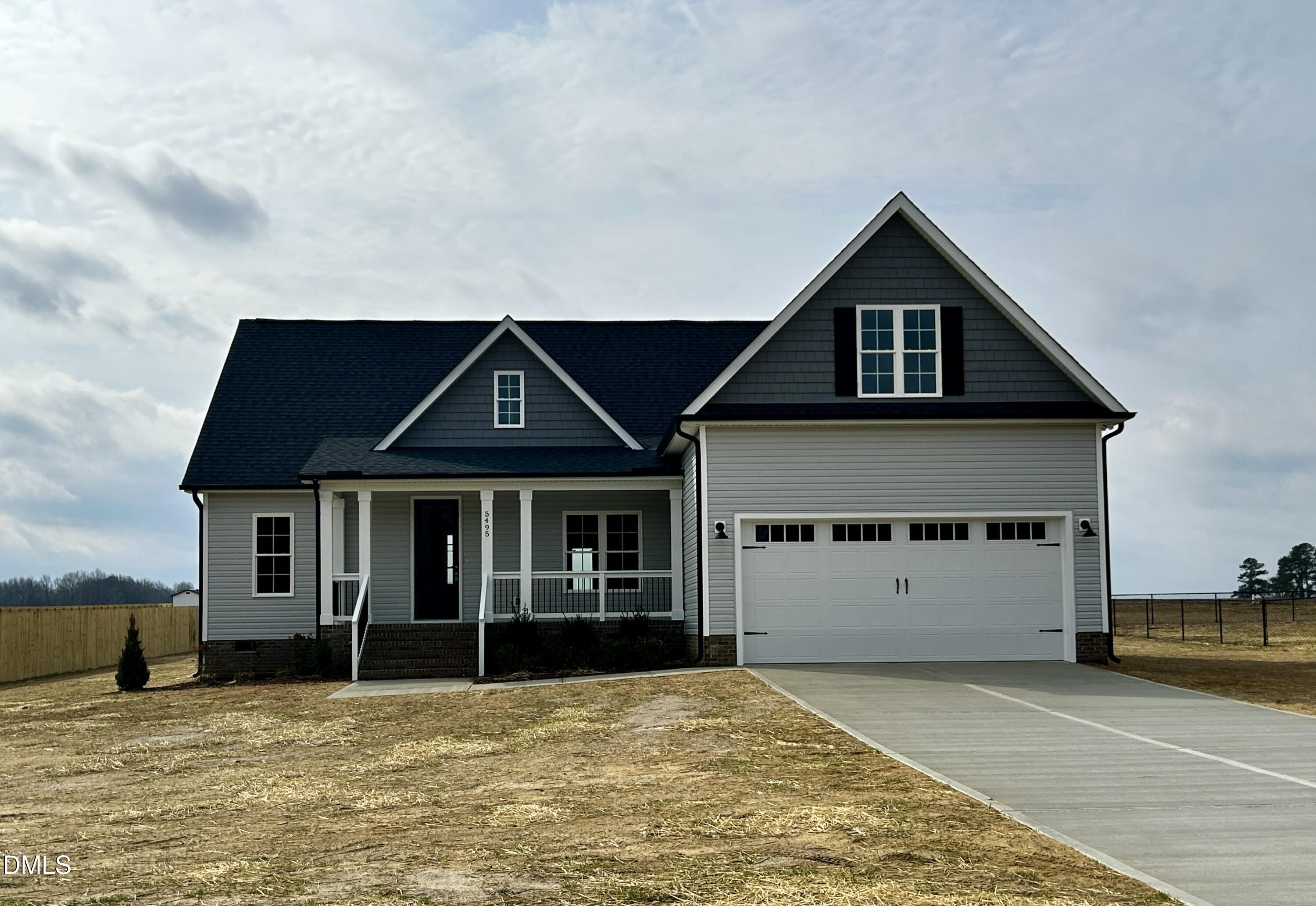 5495 Finch Road Bailey, NC 27880 - Photo 2 of 32 a front view of a house with a yard