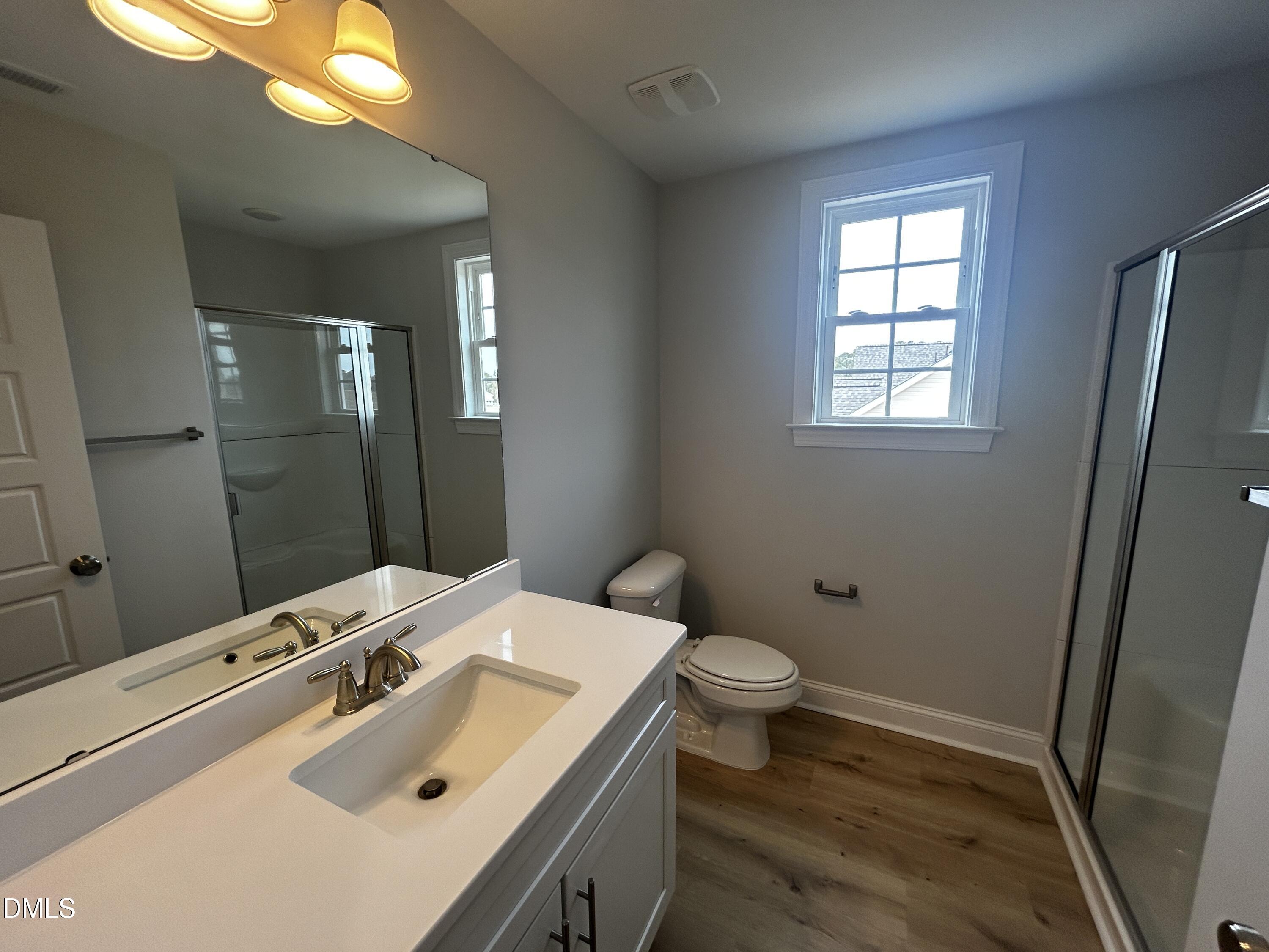 5495 Finch Road Bailey, NC 27880 - Photo 28 of 32 a bathroom with a sink toilet and tub
