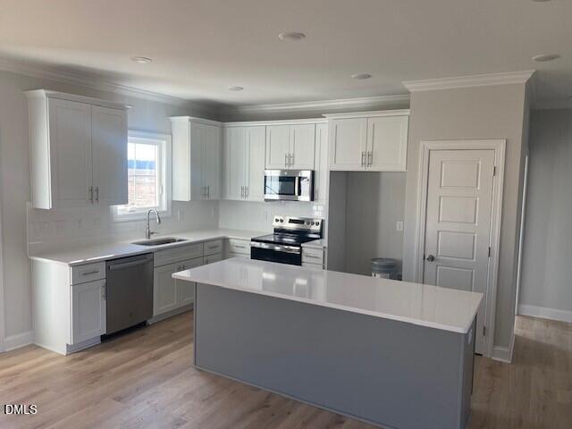 5495 Finch Road Bailey, NC 27880 - Photo 5 of 32 a kitchen with a refrigerator stove top oven and sink