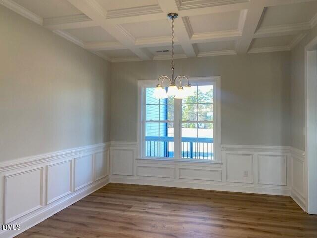 5495 Finch Road Bailey, NC 27880 - Photo 10 of 32 a view of an empty room with wooden floor and a window