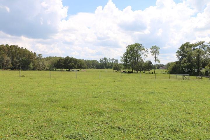 Green Swamp Road Clermont, FL 34714 - Photo 30 of 55 a view of a lake with houses in the back