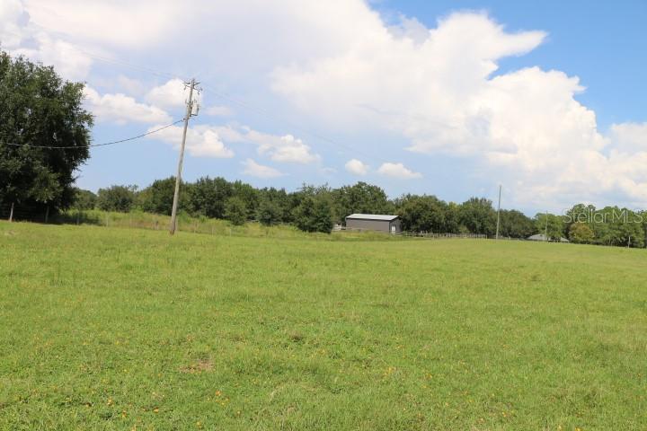 Green Swamp Road Clermont, FL 34714 - Photo 32 of 55 a view of a lake and with houses in the background