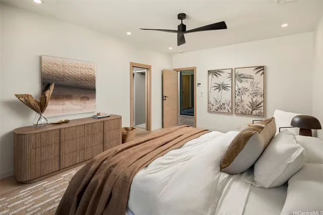 a bedroom with a bed and a dresser