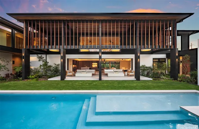 a view of a house and a yard