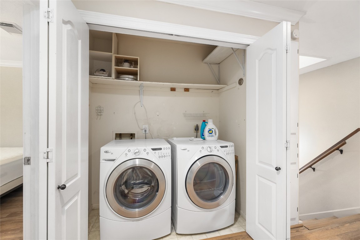 1621 Prairie Mark Lane Houston, TX 77077 - Photo 15 of 26 a utility room with dryer and washer