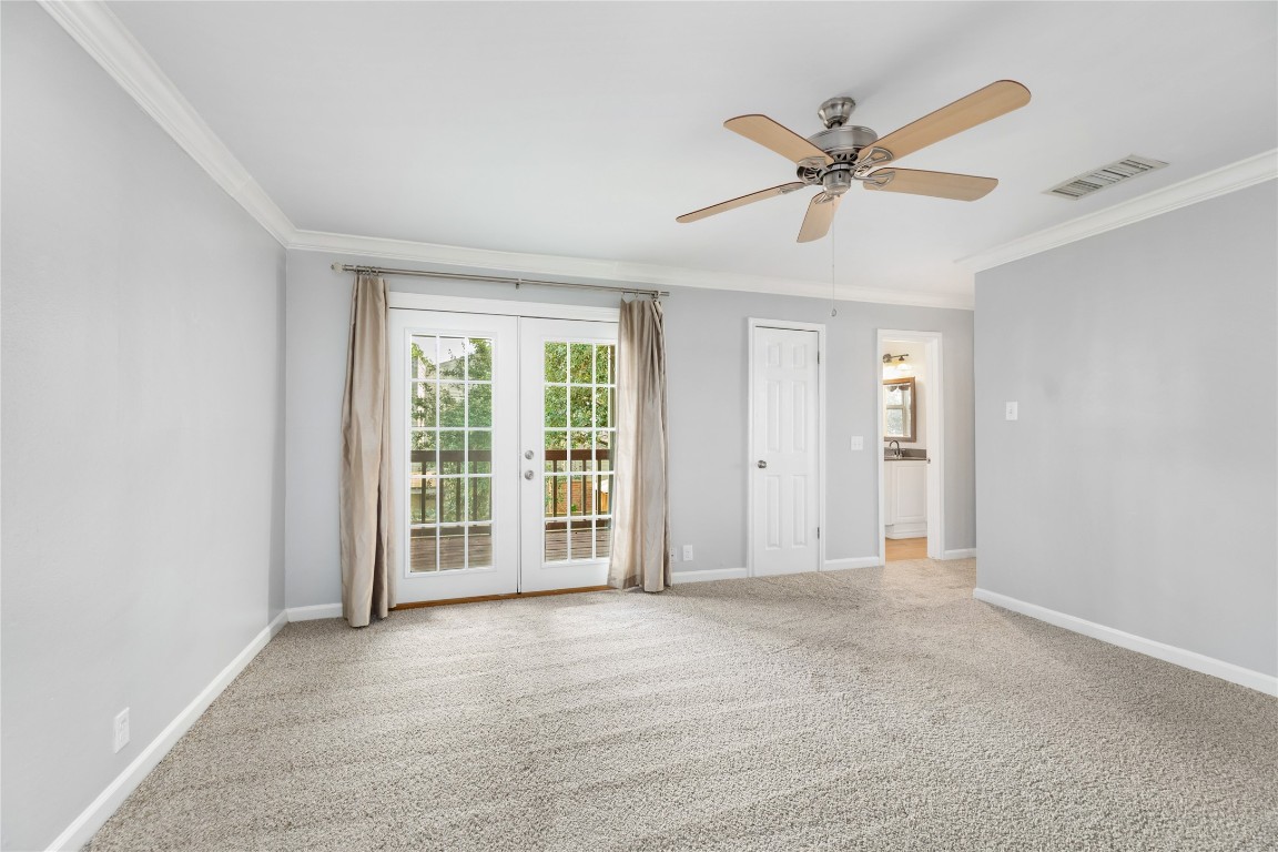1621 Prairie Mark Lane Houston, TX 77077 - Photo 25 of 26 a view of a livingroom with a ceiling fan and window